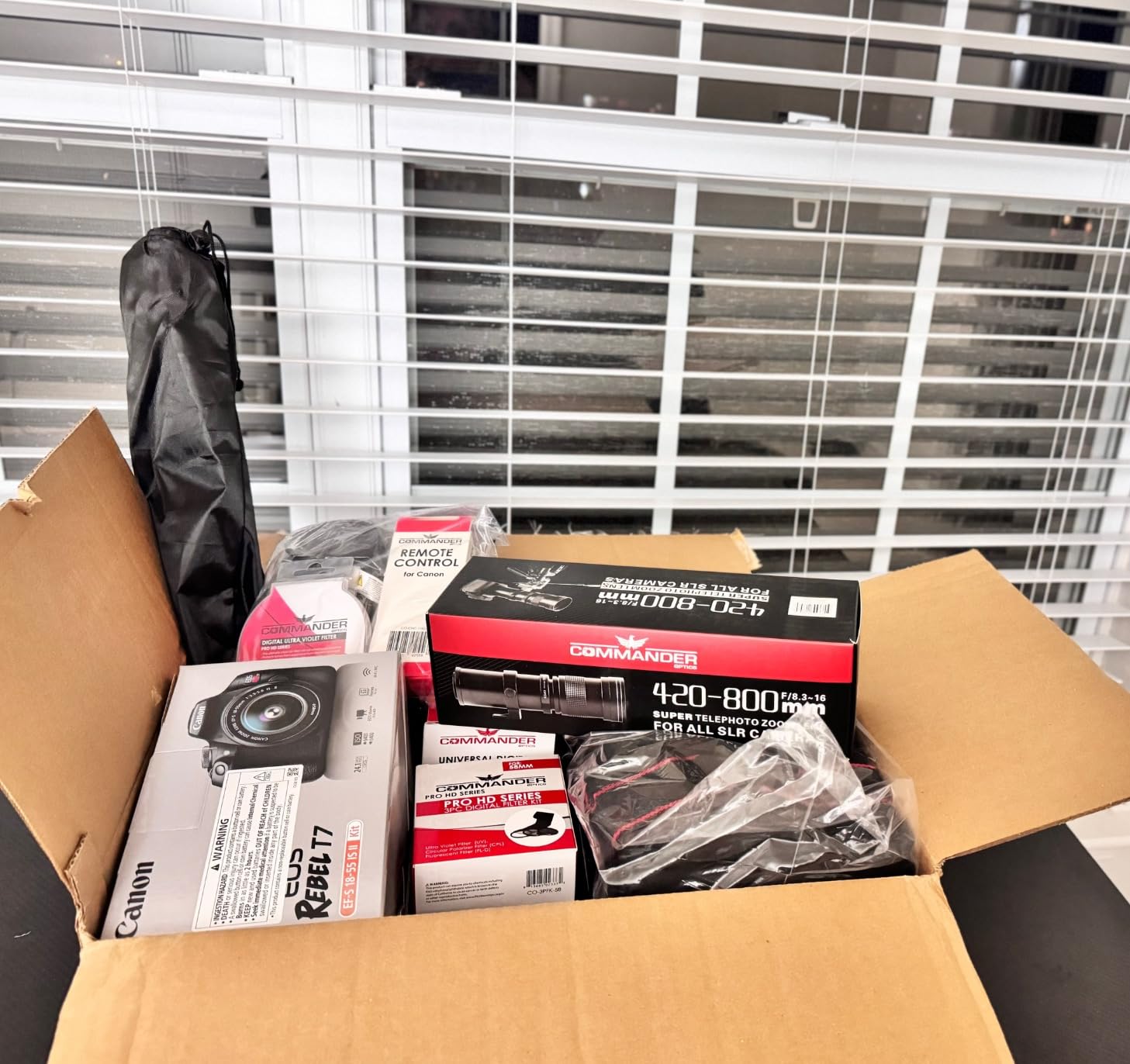 Canon EOS Rebel T7 DSLR Camera with 18-55mm is II Lens + Canon EF 75-300mm f/4-5.6 III Lens and 500mm Preset Lens + 32GB Memory + Filters + Monopod + Professional Bundle (Renewed) customer photo 1