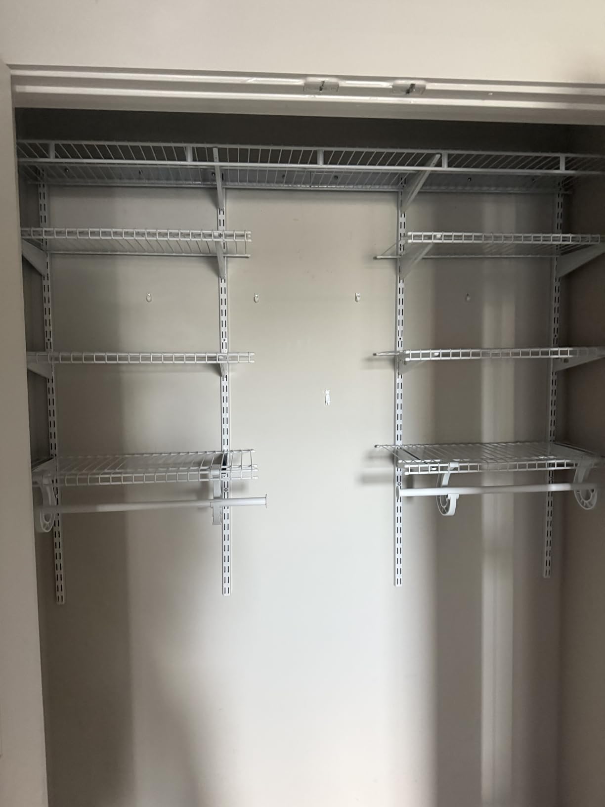 ClosetMaid ShelfTrack Wire Closet Organizer System, Adjustable from 4 to 6 Ft., with Shelves, Clothes Rods, Hardware, Durable Steel, White - Customer Photo 1
