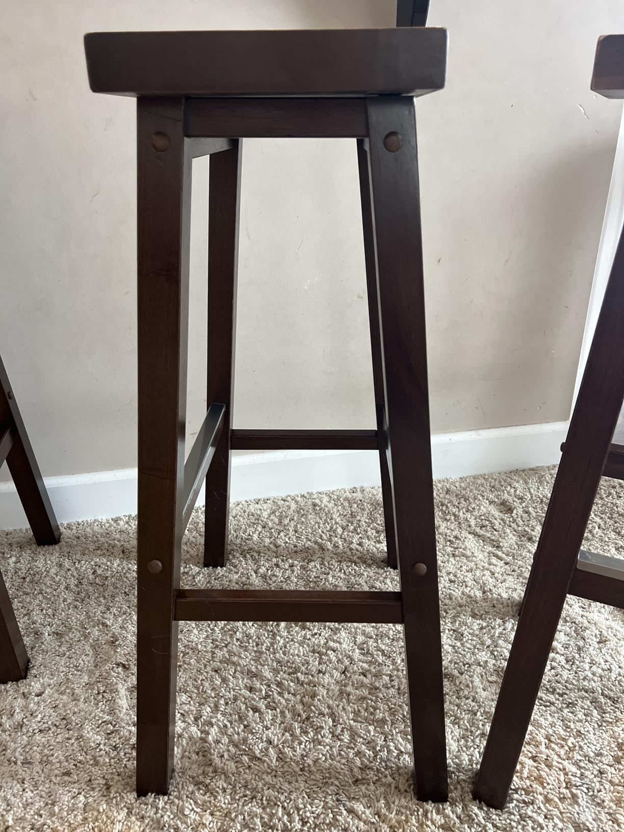 Amazon Basics Solid Wood Saddle-Seat Kitchen Counter Barstool with Footrest, Easy Assembly - 29-Inch Height - Black - Set of 2 - Customer Photo 1