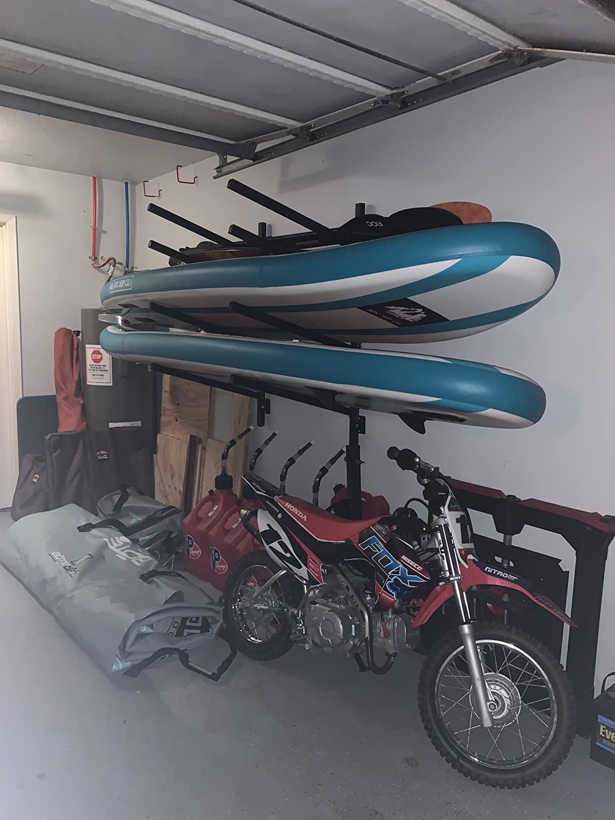 StoreYourBoard 4 Paddleboard Storage Rack, Adjustable Wall Mounted Indoor Garage Organizer, Standup Holds SUPs and Kayaks - Customer Photo 2