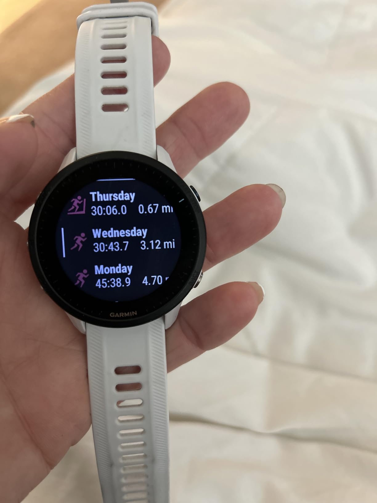 Garmin Forerunner 955, GPS Running Smartwatch, Tailored to Triathletes, Long-Lasting Battery, Whitestone - Customer Photo 1