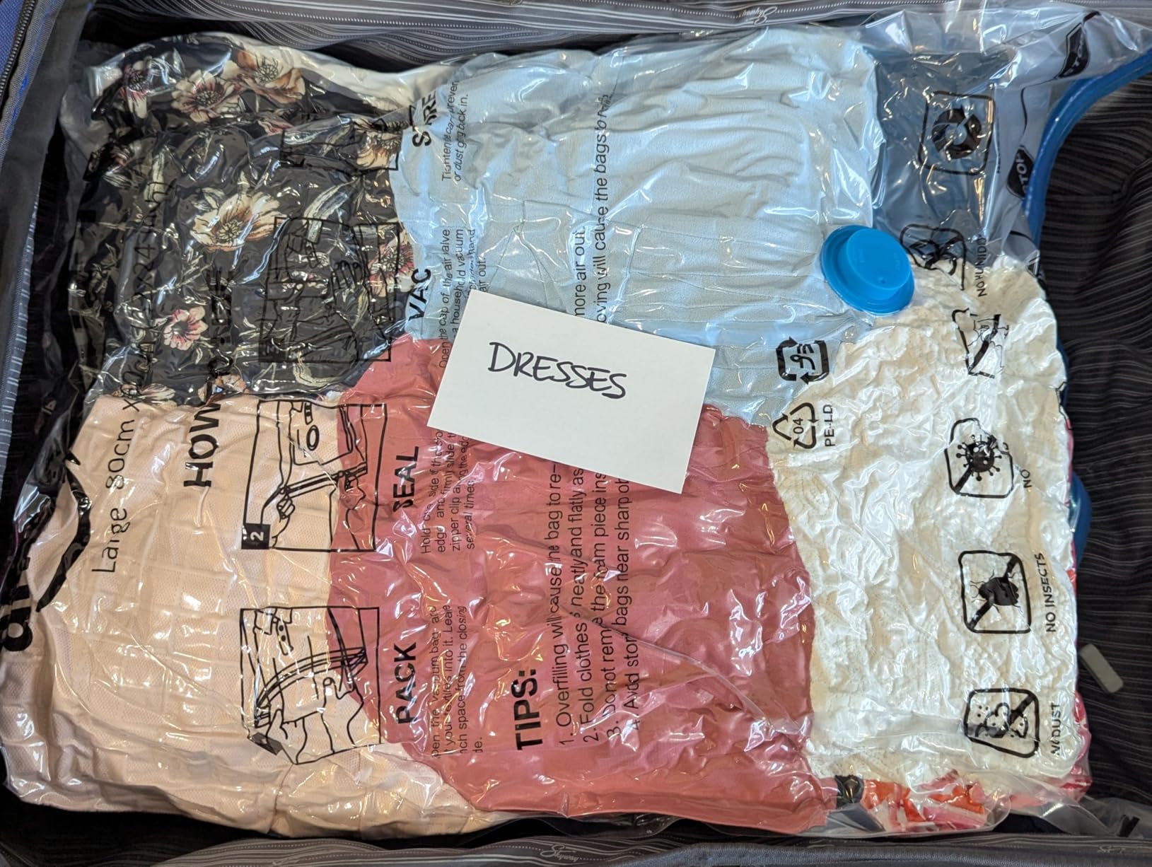 Amazon Basics Vacuum Compression Space Saving Storage Bags with Hand Pump for Travel, Multiple Sizes for Clothes and Blankets, Clear, 20 Pack (5 Small, 5 Medium, 5 Large & 5 Jumbo) - Customer Photo 2