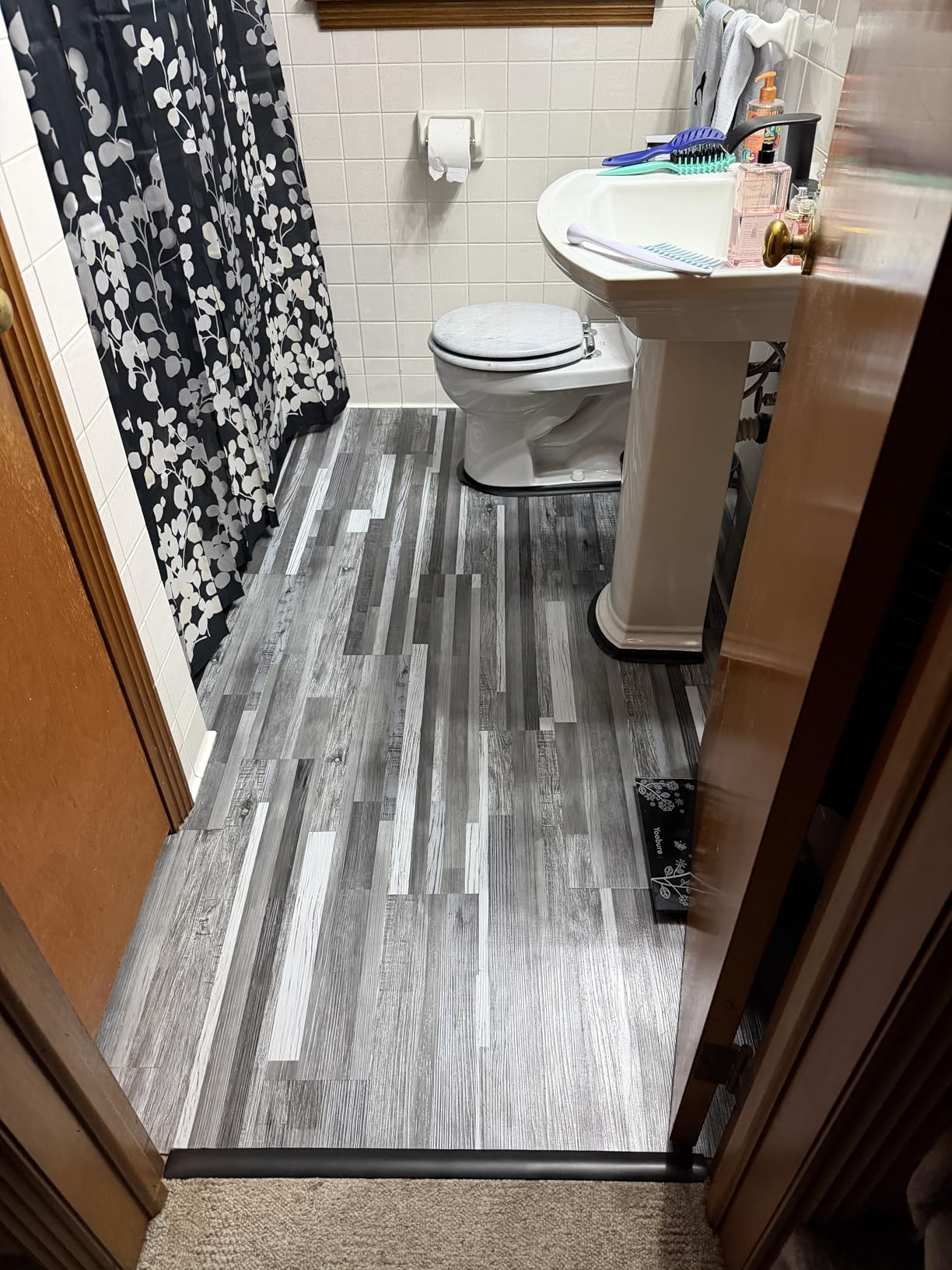 Art3d 36-Pack 54 Sq.ft Peel and Stick Floor Tiles Vinyl Plank Flooring Wood Look, Adhesive and Waterproof Tile Sticker for Bedroom, Living Room, Kitchen, RV in Black - Customer Photo 1