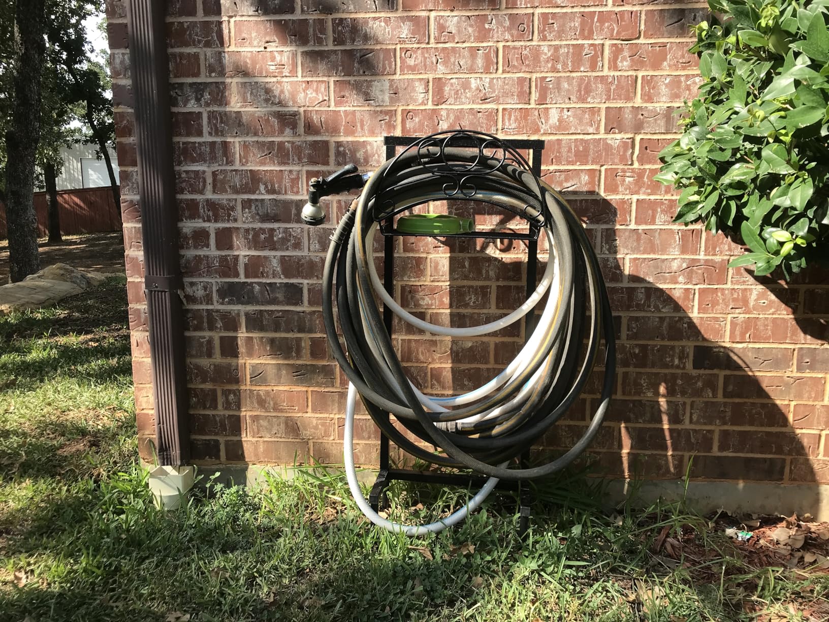 TomCare Garden Hose Holder Upgraded Water Hose Holder with Storage Basket Heavy Duty 4 Spikes Hose Hanger Holds 160 Feet Hoses Stable Freestanding Hose Storage Organizer for Outside Yard - Customer Photo 2