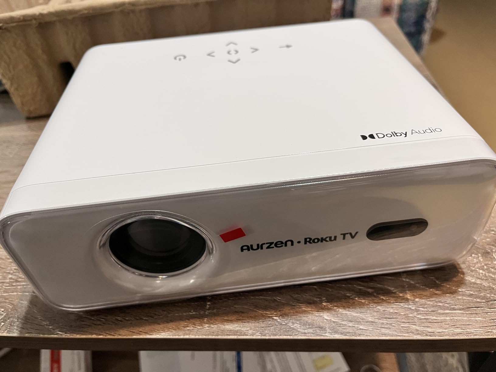 Aurzen Roku TV Smart Projector with Wifi and Bluetooth, Roku Streaming Experience Built-in, 1080P FHD, Dolby Audio, Auto Focus & Keystone, Zoom, Movie Portable Outdoor Mini Projector, White customer photo 1