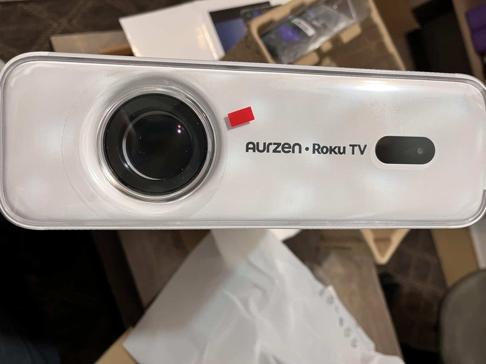 Aurzen Roku TV Smart Projector with Wifi and Bluetooth, Roku Streaming Experience Built-in, 1080P FHD, Dolby Audio, Auto Focus & Keystone, Zoom, Movie Portable Outdoor Mini Projector, White - Customer Photo 3