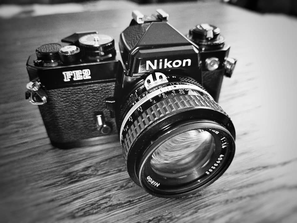 FE2 film SLR camera with black body; no lens customer photo 1