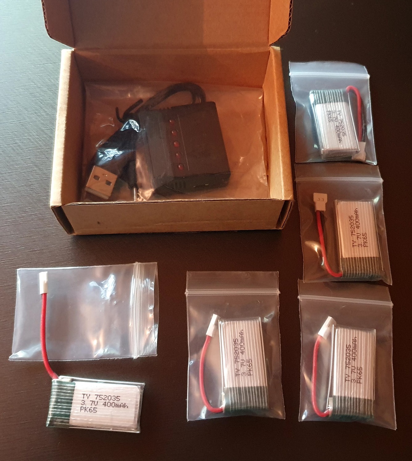 Fytoo 5PCS 3.7V 400mAh Lithium Battery with 5 in 1 Charger for SYMA Q11 H99W H31 H6C H98 AT-96 TR-C385 TR-P51 TR-F22 Quadcopter customer photo 1