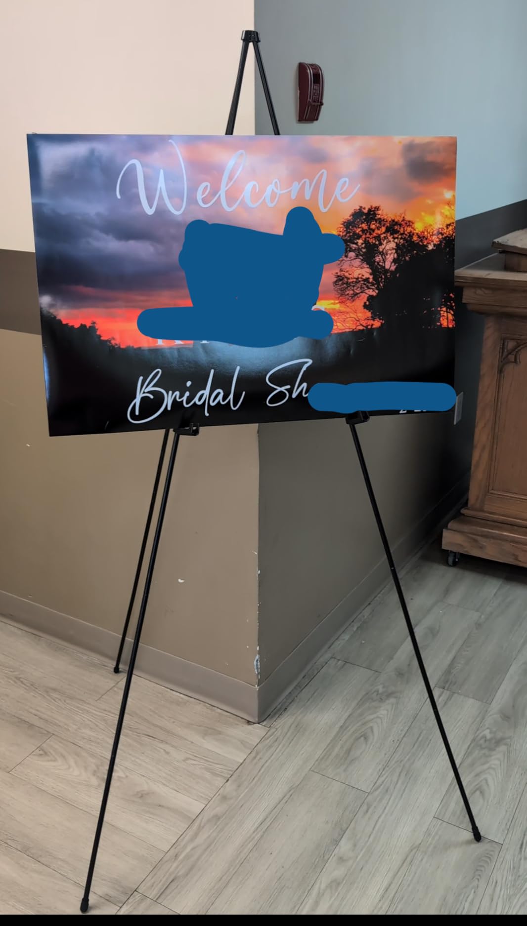 Amazon Basics Easel Display Stand, Instant Floor Poster, Lightweight, Collapsible and Portable with Tripod Base, Black Steel (supports 5 pounds) customer photo 2
