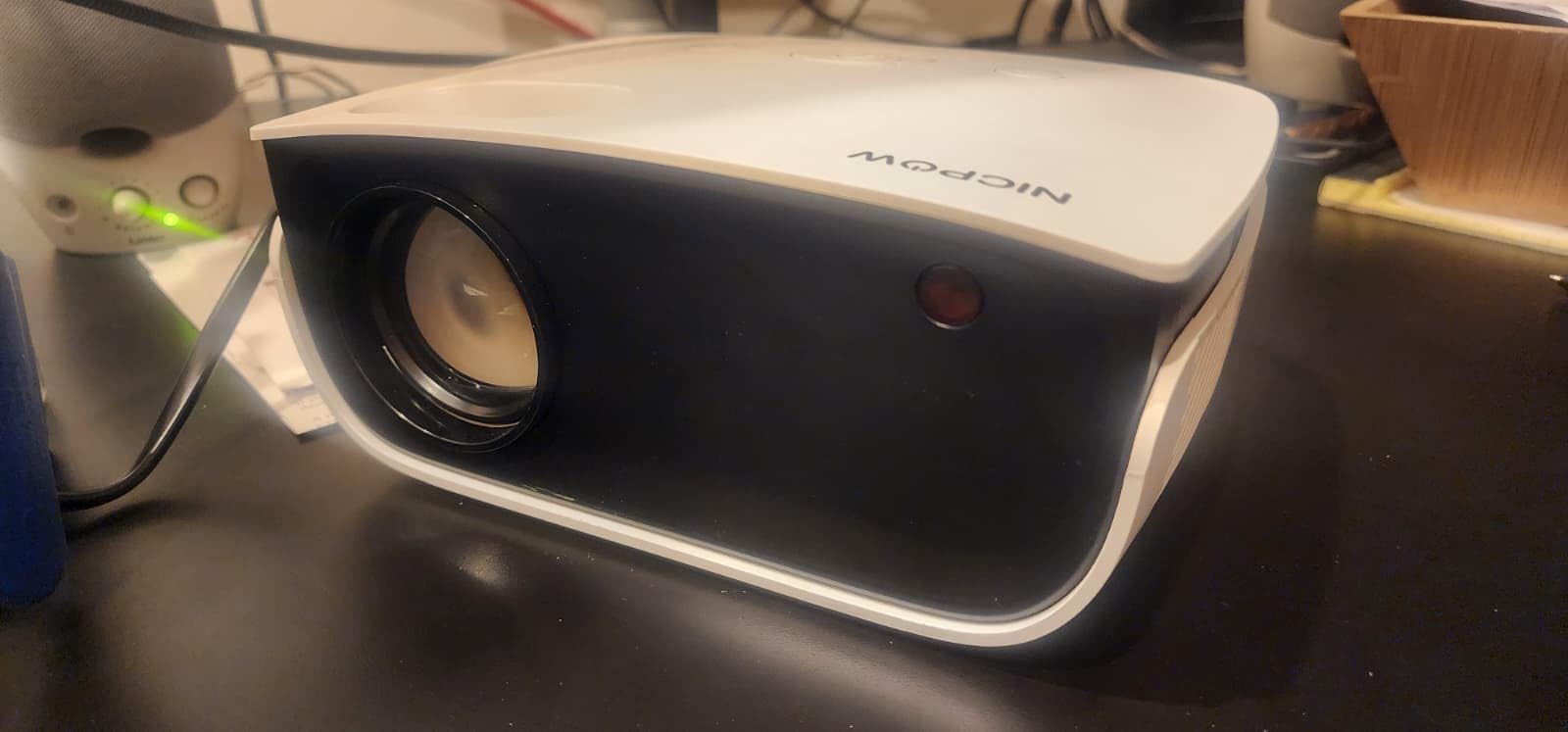 NICPOW Upgrade Portable Outdoor Movie Projector, 1080P and 200 Inch Supported Small Projector Compatible with TV Stick, Phone, PS5, HDMI, USB for Home, Bedroom, Gaming, Outdoor Use customer photo 1