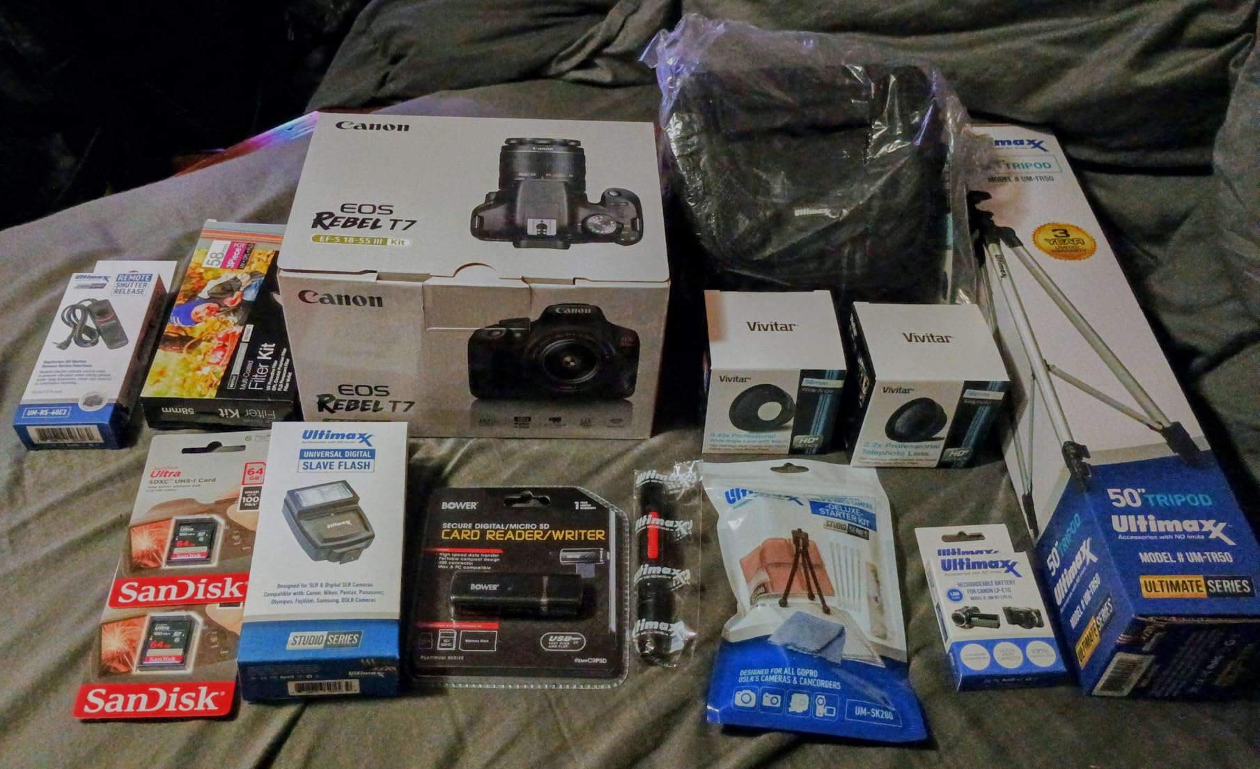 Canon EOS Rebel T7 DSLR Camera Bundle with Canon EF-S 18-55mm f/3.5-5.6 is II Lens + 2X 32GB Memory Cards + Filters + Preferred Accessory Kit, Black (Renewed) customer photo 1