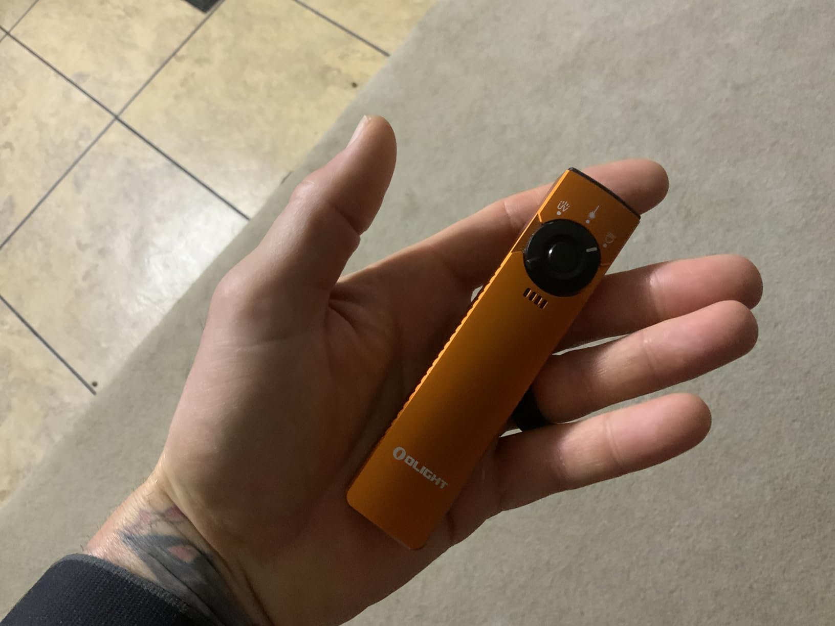 OLIGHT Arkfeld Pro Rechargeable EDC Flat Flashlight with Green Beam, UV and White LED Combo, 1300 Lumens Portable Pocket Lights, Triple Sources for Outdoors Emergency Working (Black CW) customer photo 1