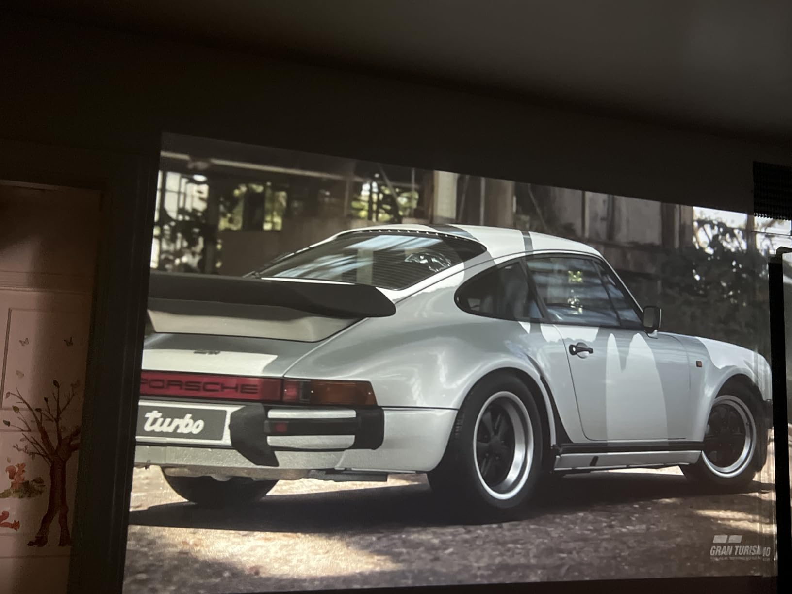 XuanPad Smart Mini Projector with WiFi and Bluetooth, Officially-Licensed App & Auto Focus, 4K Support Movie Projector, Portable Native 1080P Outdoor Projector with 360 Degree Stand customer photo 1