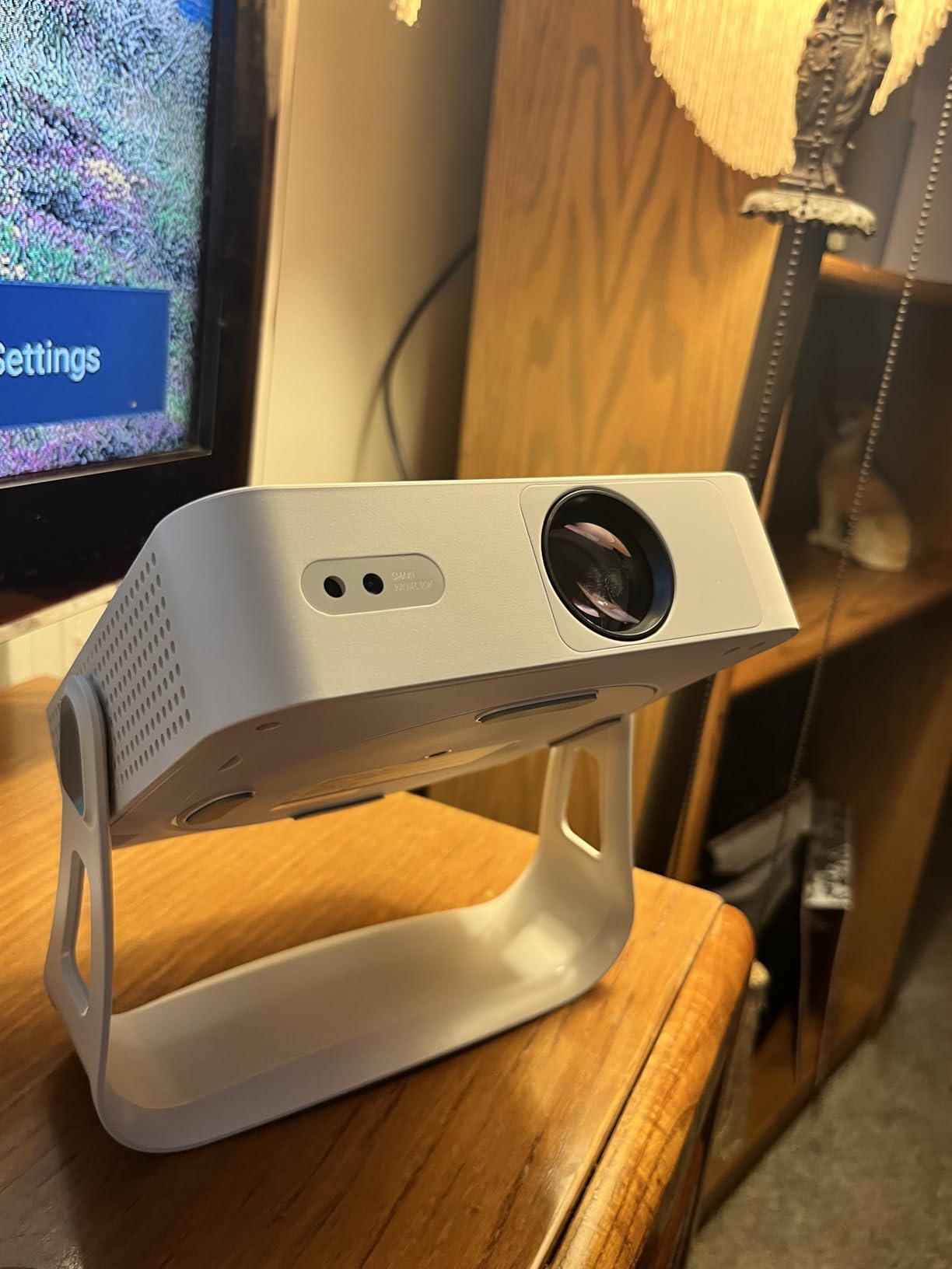 XuanPad Smart Mini Projector with WiFi and Bluetooth, Officially-Licensed App & Auto Focus, 4K Support Movie Projector, Portable Native 1080P Outdoor Projector with 360 Degree Stand customer photo 2