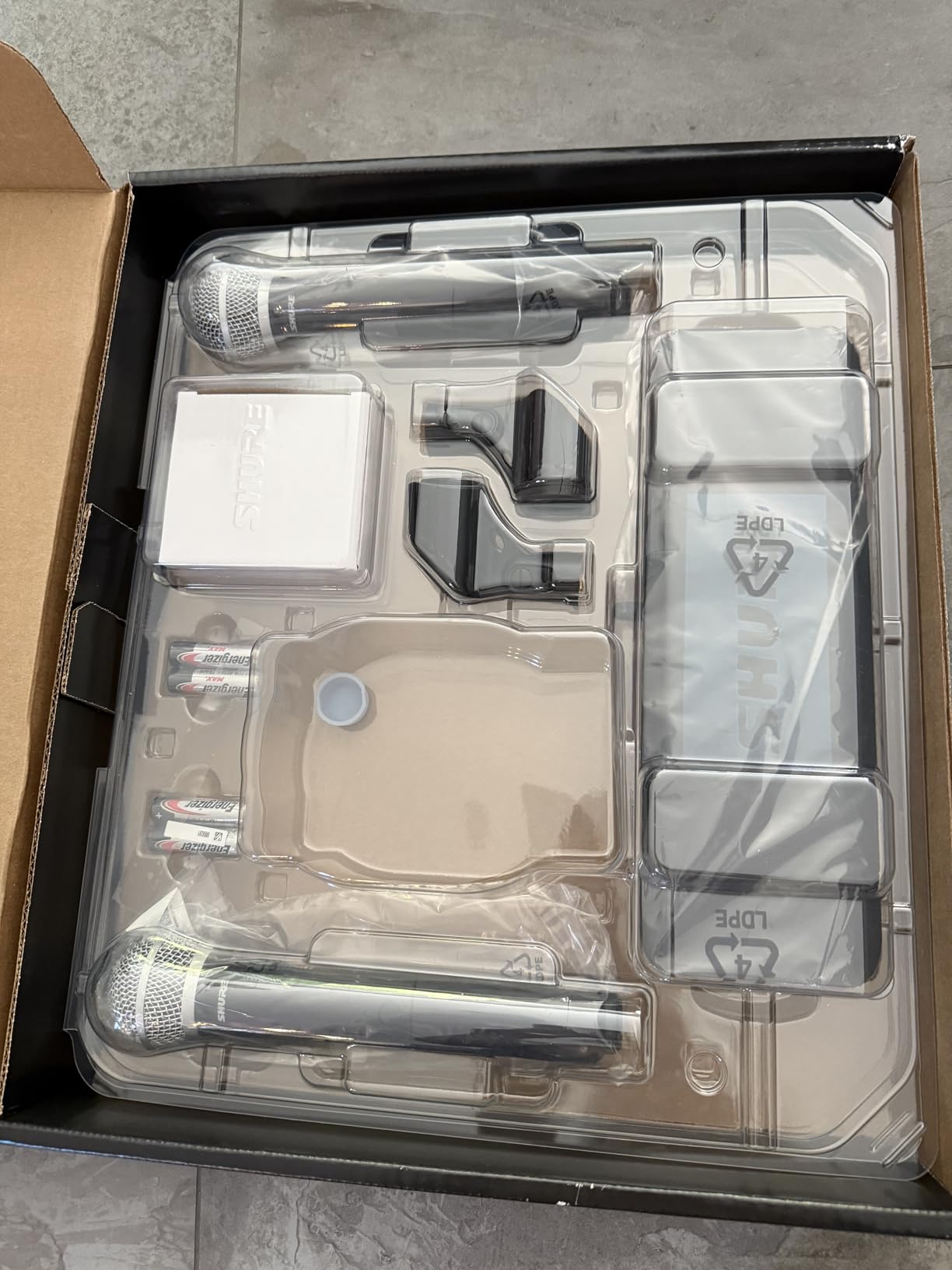 Shure BLX288/PG58 Dual-Channel Wireless Audio System J11 Band (596-620 MHz) - BLX88 Receiver, (2) BLX2 Transmitters with PG58 Dynamic Mic, Up to 14 Hr Battery, 300 ft Range customer photo 1