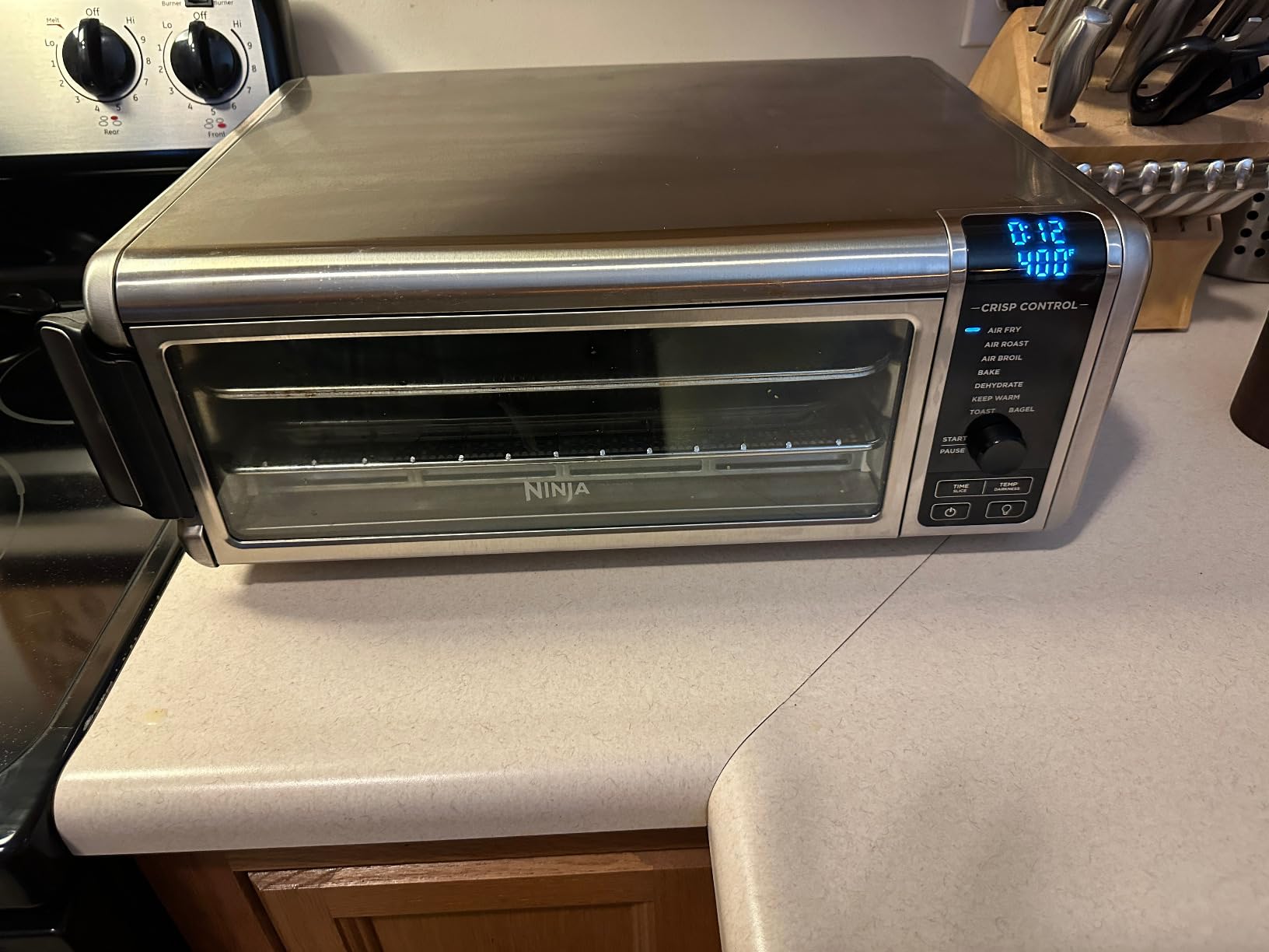 Ninja Digital Air Fryer & Toaster Oven | 8-in-1 Functionality | Flip-Up Design | XL Capacity | Air Fry Basket, Sheet Pan, Wire Rack & Crumb Tray | 1800 Watt | Silver | SP101 customer photo 1