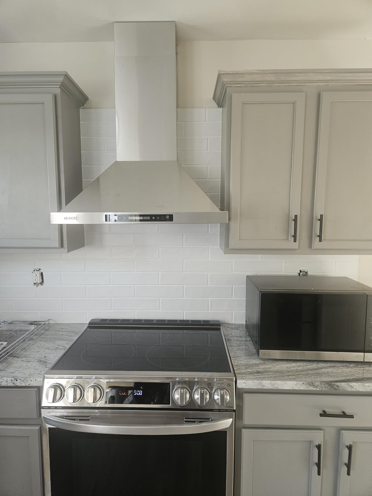 IKTCH 36-inch Wall Mount Range Hood 900 CFM Ducted/Ductless Convertible, Kitchen Chimney Vent Stainless Steel with Gesture Sensing & Touch Control Switch Panel, 2 Pcs Adjustable Lights (IKP02-36) customer photo 2