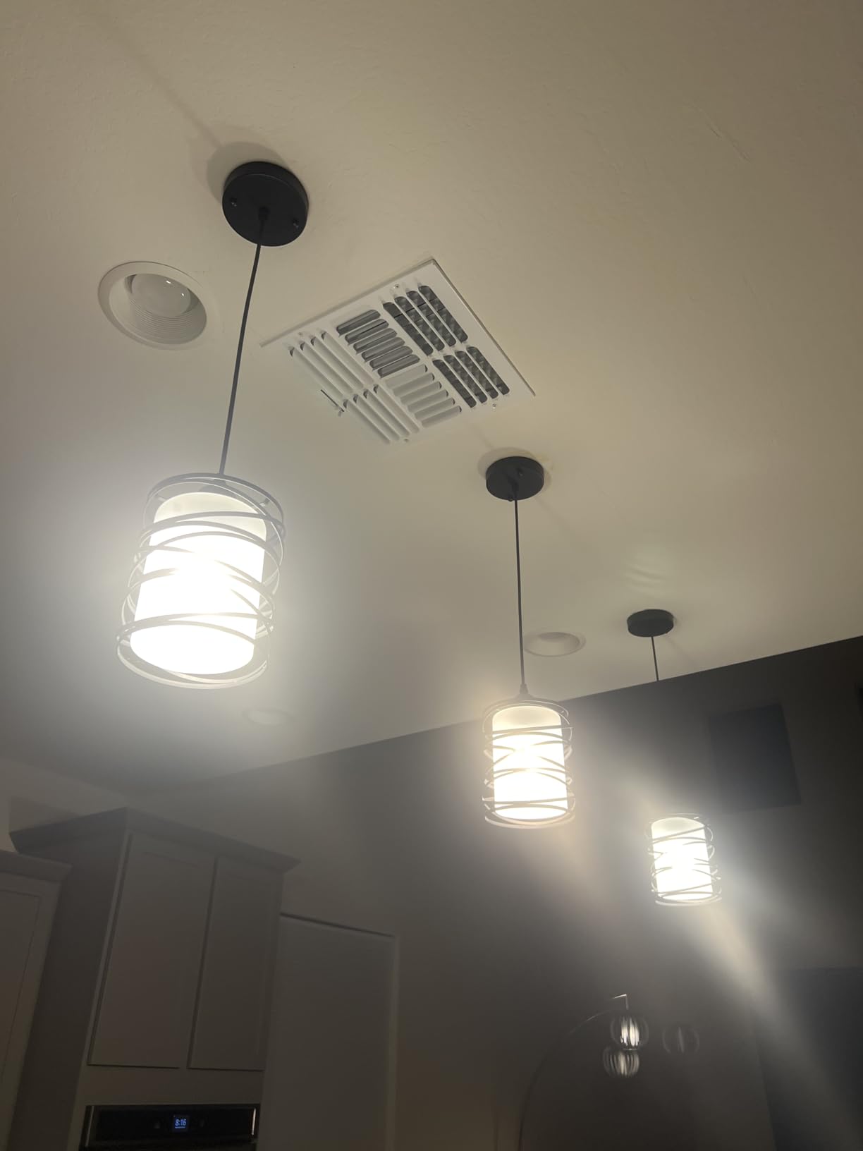 Modern Mini Pendant Light Fixture Kitchen Island Pendant Lighting 6.30'' Matte Black Spiral Cage Handblown Clear Seeded Glass Shade Hanging Lamp Adjustable Cord for Dining Room 1-Pack,E26 customer photo 1