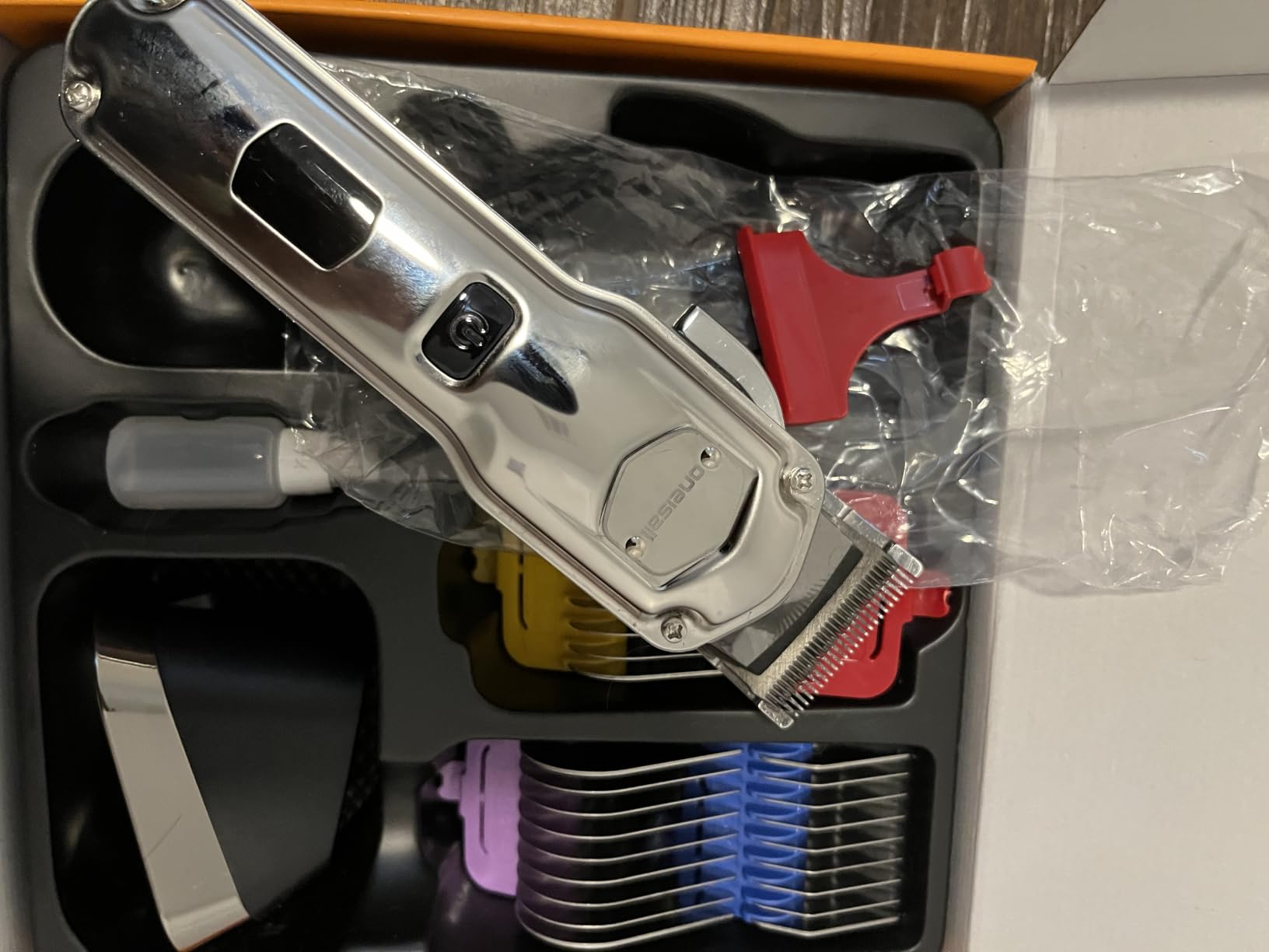 oneisall Professional Dog Grooming Clippers: Cordless Rechargeable Thick Hair Clipper with Detachable Metal Combs, Low Noise Heavy-Duty Pet Clippers for Curly/Fine/Wavy Hair, 676pro (Silver) customer photo 2