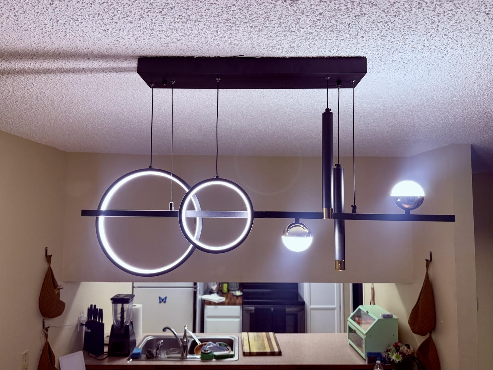 ORANOOR Modern LED Pendant Lights, Dimmable 47in Silver LED Chandelier Lighting, Upgraded Chrome Linear Dining Room Hanging Light Fixtures Kitchen Island Globe Pendant Light for Dining Table (4200lm) customer photo 1