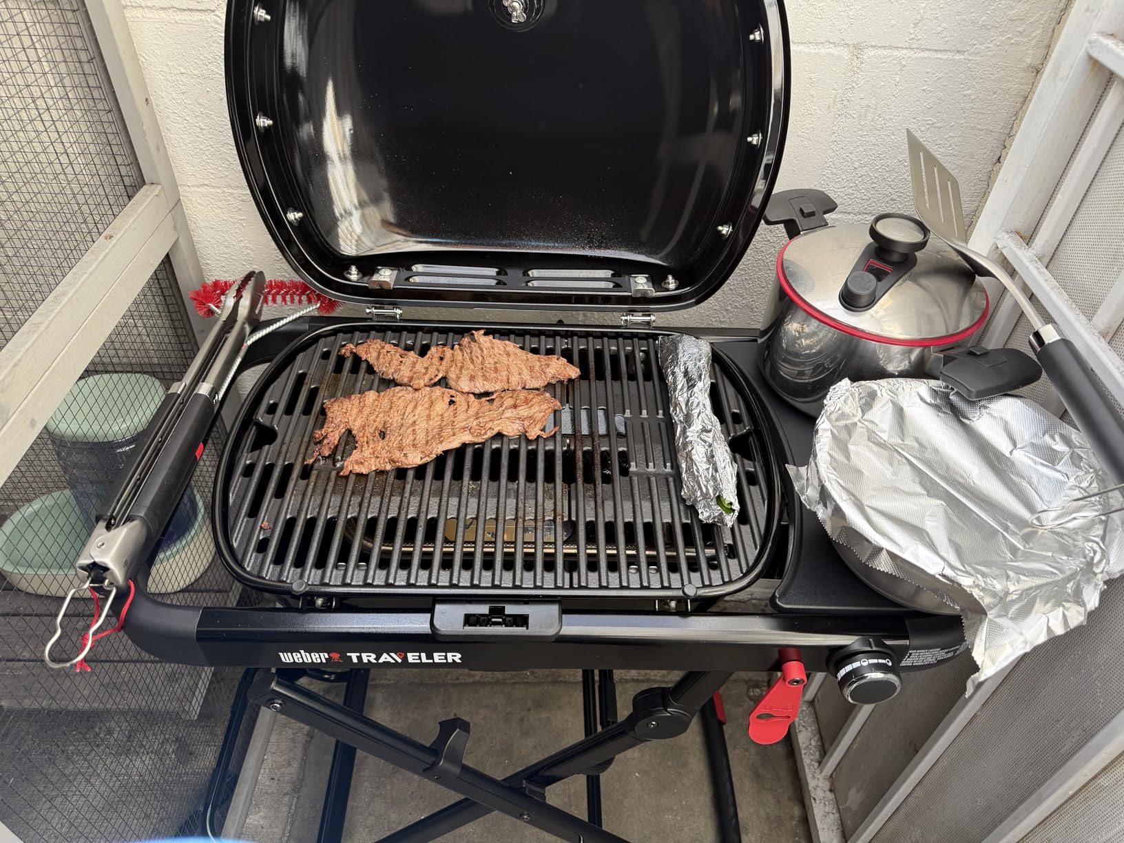 Weber Traveler® Compact Portable Gas Grill (Liquid Propane) for Outdoor Cooking - Black, Porcelain-Enameled Lid, Side Table, Folding Portable Grill with Wheels for Camping, Tailgating & Travel customer photo 2
