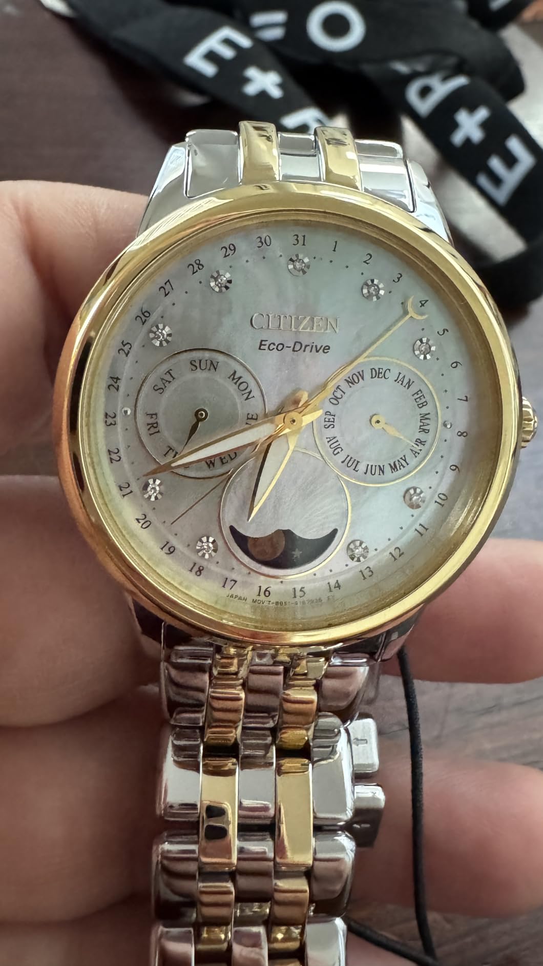 Women's Eco-Drive Calendrier, Moon Phase Diamond Accents Dial, Stainless Case and Bracelet Watch, Month/Day/Date customer photo 2