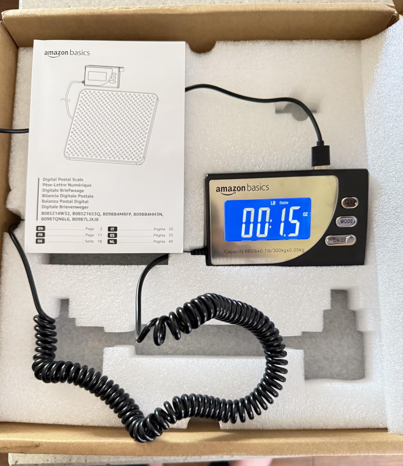 Amazon Basics Digital Shipping Postal Scale with Tare Function, Heavy Duty Weighing Platform, 660 lb Capacity, 1 Ounce Readability, Portable, Black customer photo 1