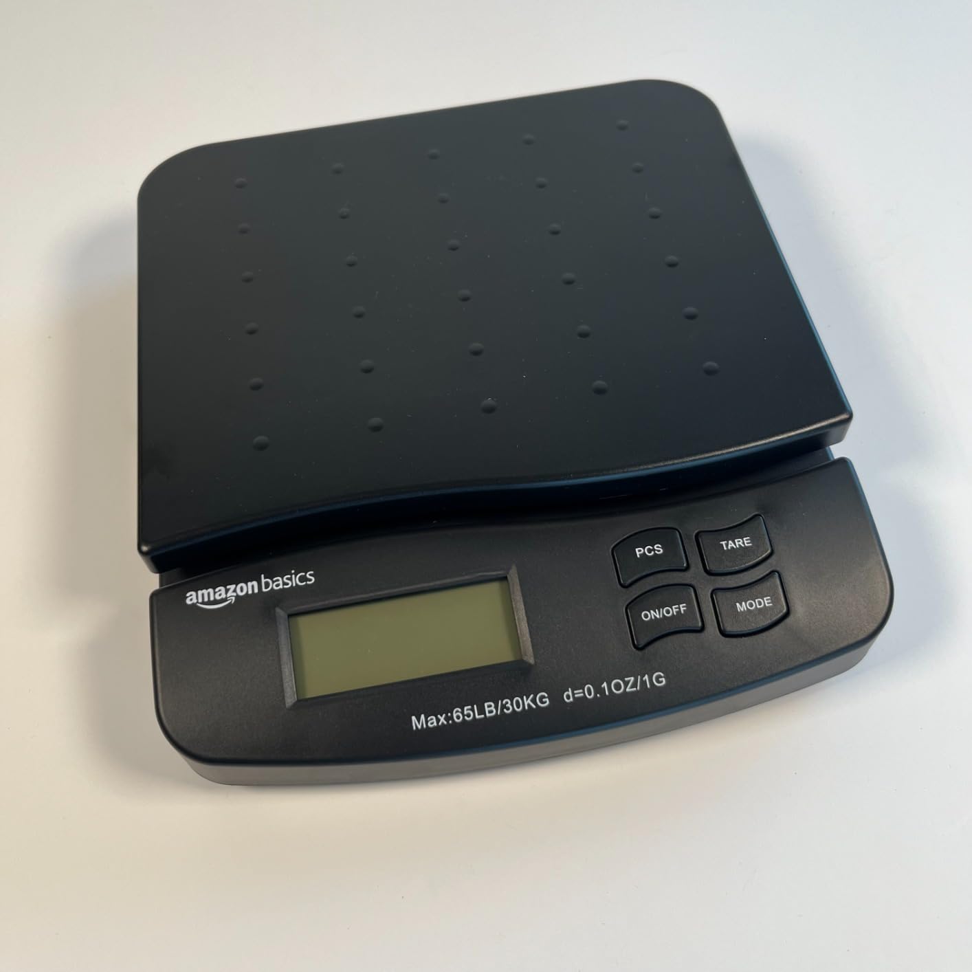 Amazon Basics Digital Postal Shipping Scale with Tare Function, AC Adapter, 65 lb Capacity, 0.1 oz Readability, LCD Display, Black customer photo 2