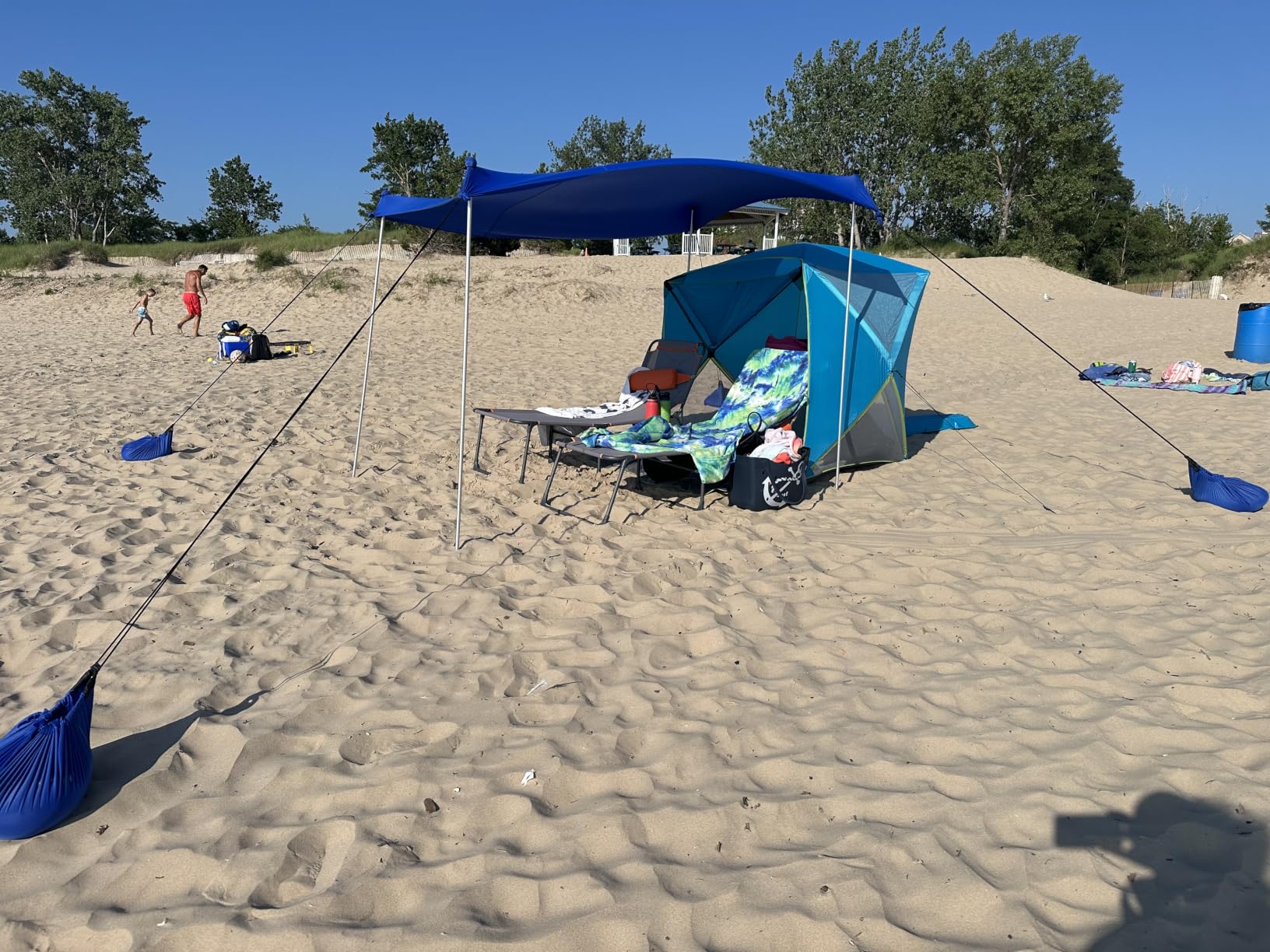 UMARDOO Family Beach Tent Canopy Sun Shade Portable 10x10FT, Large Wind Resistance Beach Sun Shelter Easy Setup with Packable Carry Bag for Outdoor Travel UPF 50+ (Blue) customer photo 2