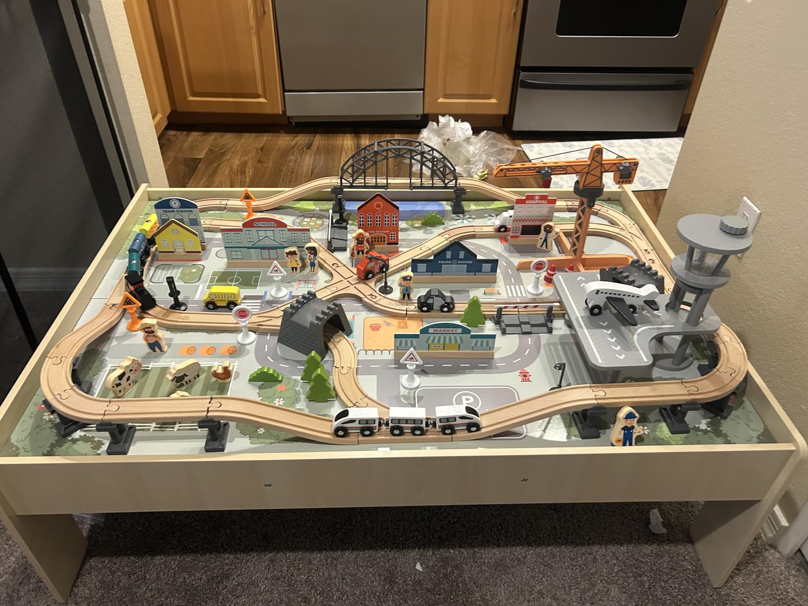 Amazon Basics 120 Piece Wooden Train Set with Activity Table, Sturdy Tracks, Storage Bin, Easy to Assemble, Kids Gift for Age 3Y+, 47.44 x 33.46 x 16.14 in customer photo 1