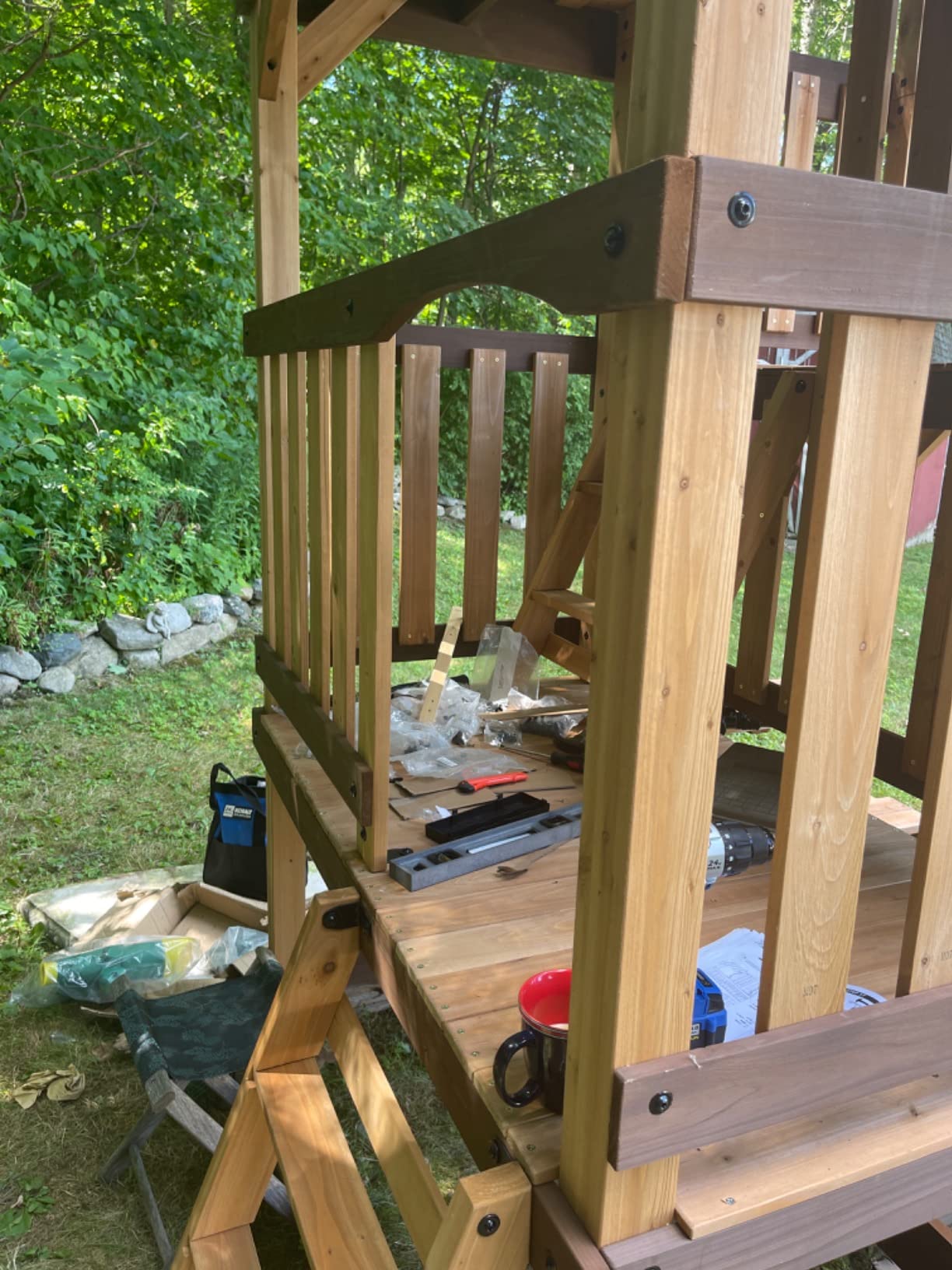 Backyard Discovery Highlander Cedar Wood Swing Set with Wave Slide, Three-Story Clubhouse, Rock Wall, Picnic Table, Belt Swings, Web Swing, Sandbox, Three Ladders, Toy Accessories, Outdoor Playset customer photo 1
