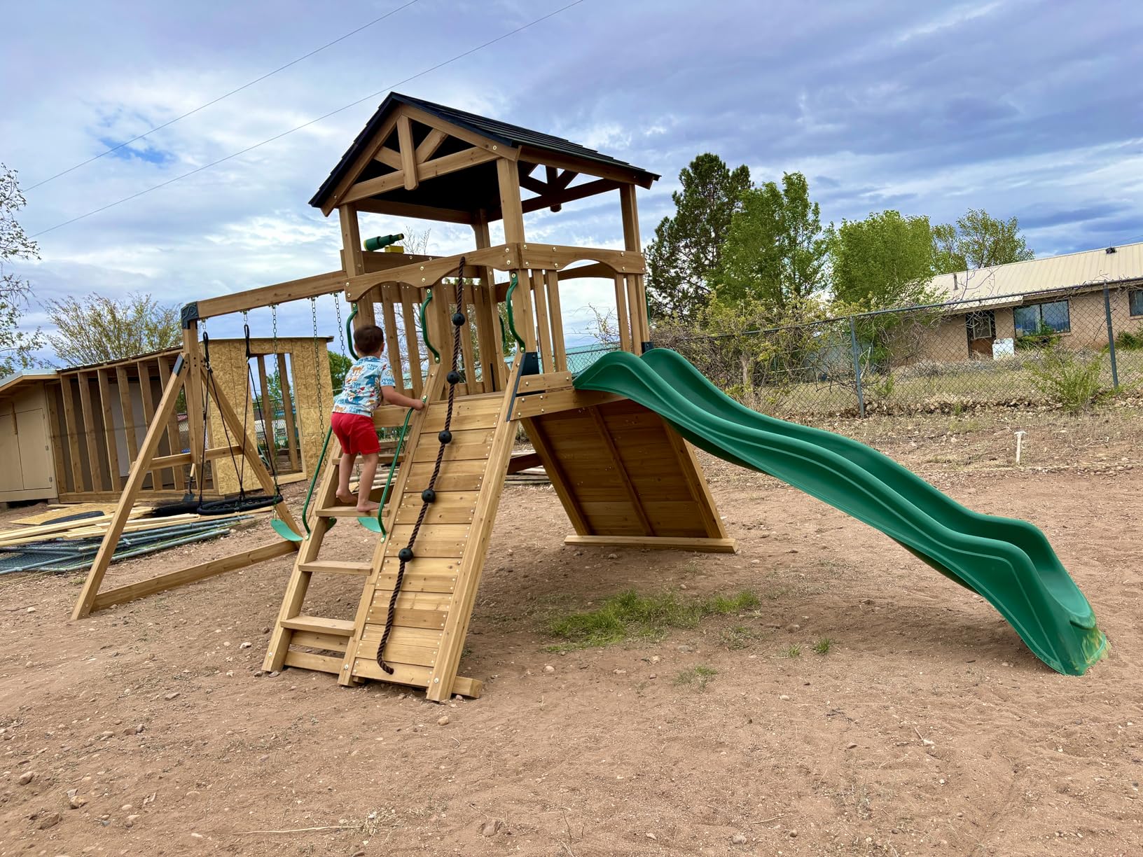 Backyard Discovery Endeavor II Cedar Wood Swing Set with Wave Slide, Play Deck, Double Rock Wall, Picnic Table, Climbing Wall, Belt Swings, Web Swing, Toy Telescope, Step Ladder, Outdoor Playset customer photo 1