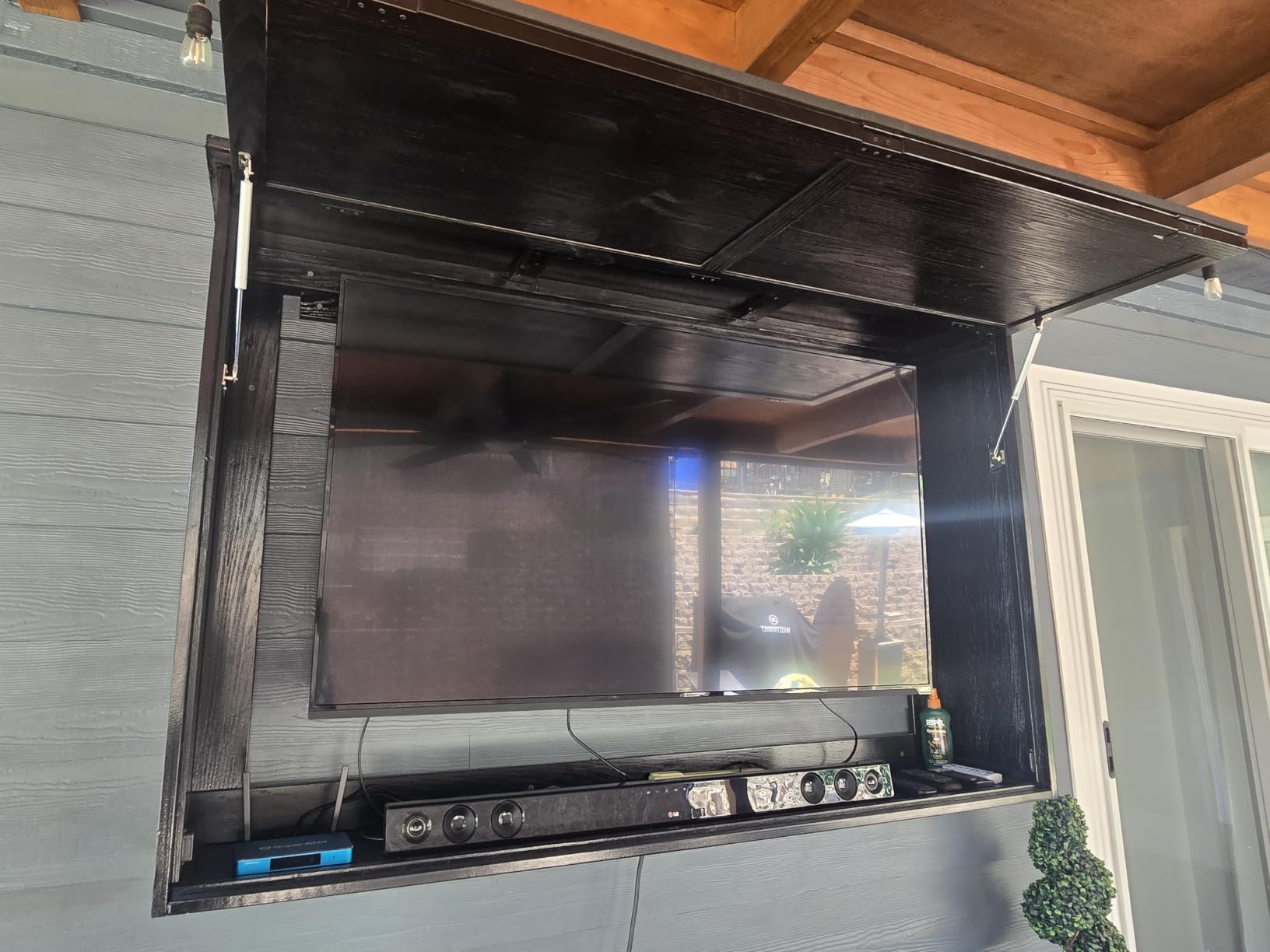 GDLF Outdoor TV Enclosure for 32-43 Inch TVs with Single-Arm Mount | Solid wood construction, black finish, and a fold-up front suit covered patios, decks, and sheltered entertainment areas customer photo 1
