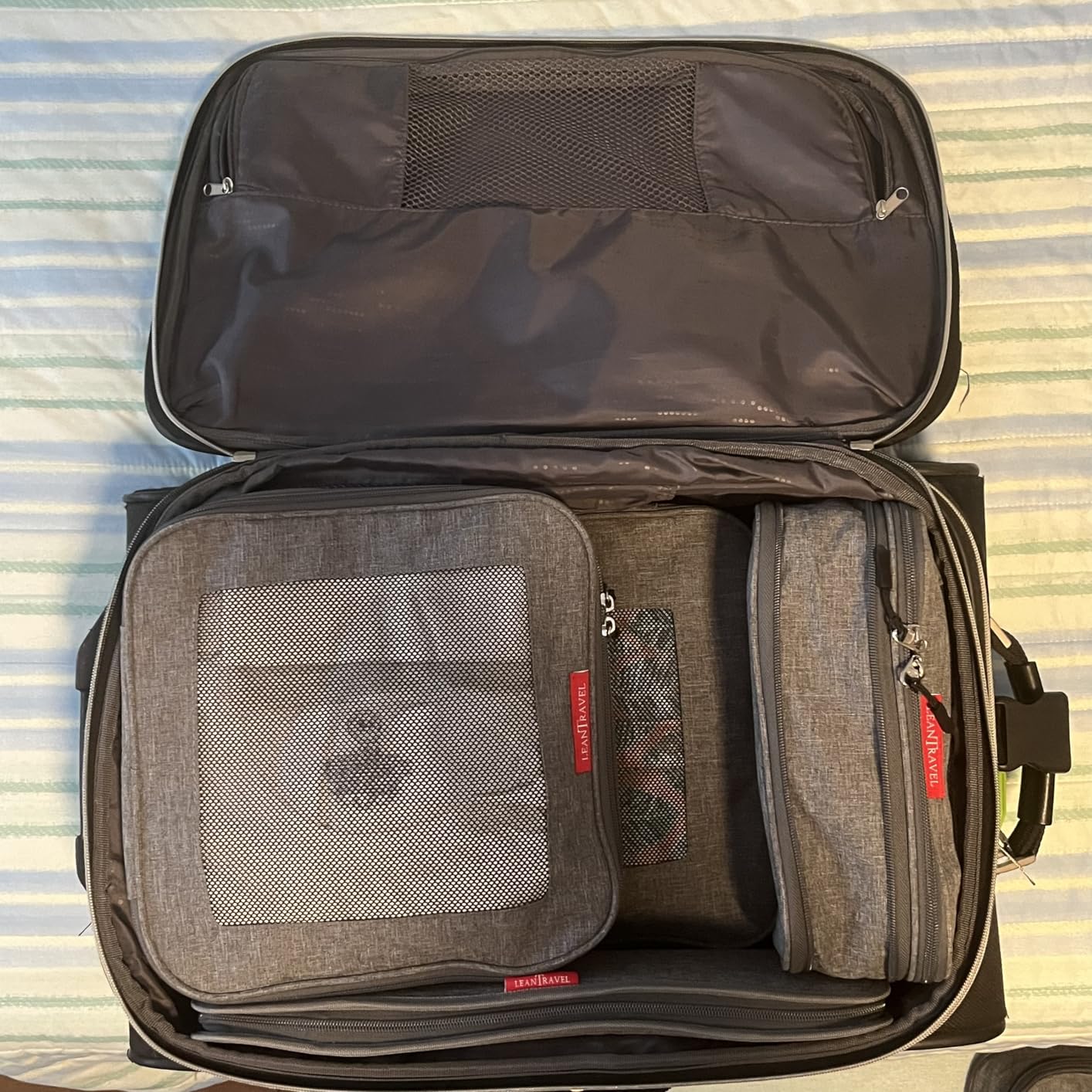 LeanTravel Premium Compression Packing Cubes for Travel - Suitcase Organizer Bags with Double Zipper & Breathable Mesh Panel - Space Saving Carry On Luggage Essentials (4-Pack, Black) customer photo 1
