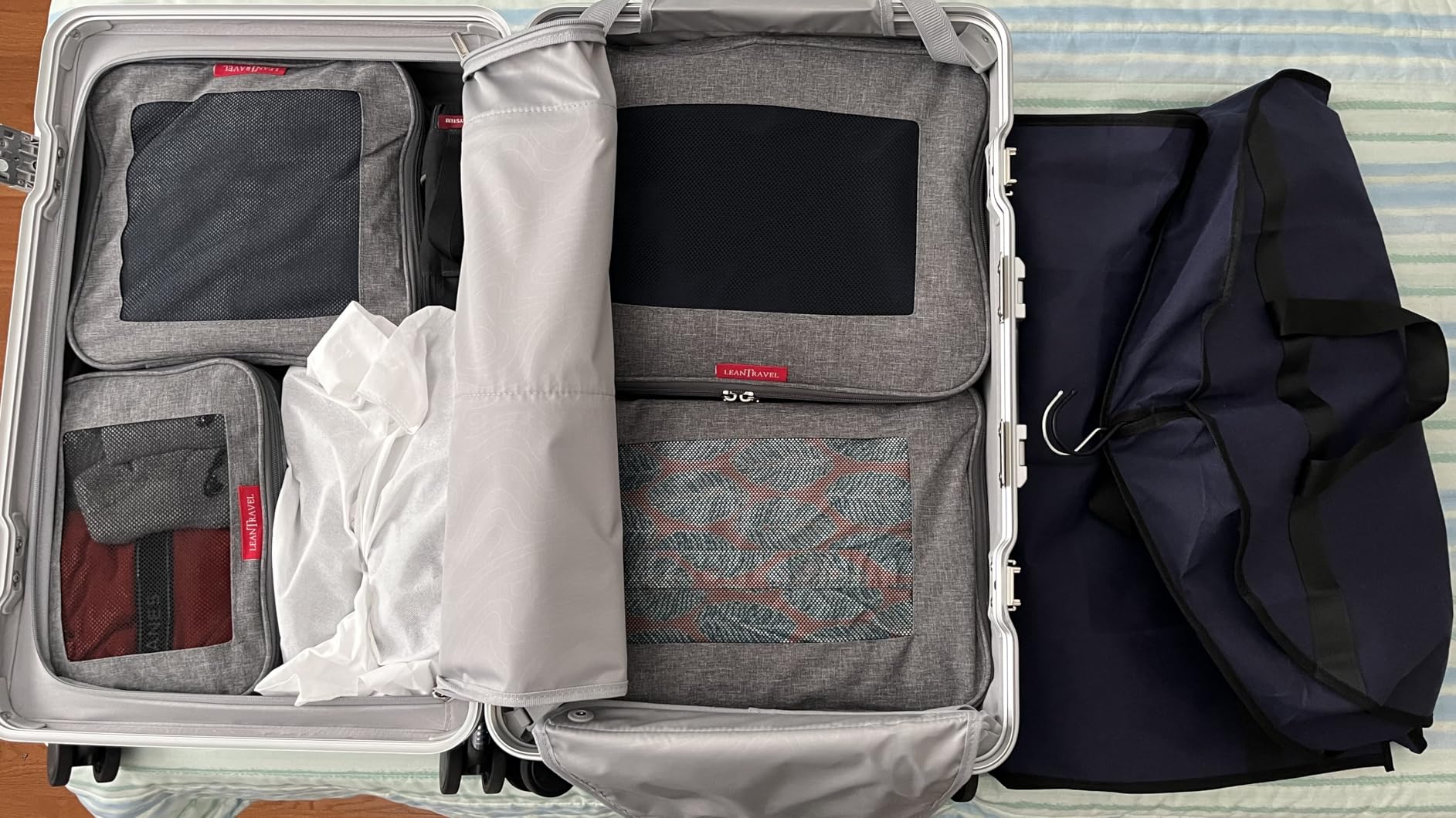 LeanTravel Premium Compression Packing Cubes for Travel - Suitcase Organizer Bags with Double Zipper & Breathable Mesh Panel - Space Saving Carry On Luggage Essentials (4-Pack, Black) customer photo 2
