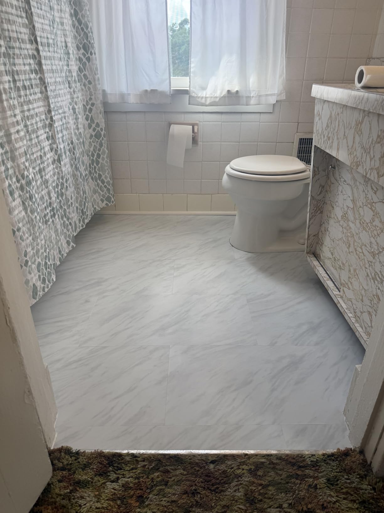 Art3d Marble Textured Click-Lock Vinyl Floor Tiles 12-Pack, 24x12 Inch Floor Planks - Waterproof Flooring for Living Room, Kitchen, Basement, Ideal for New Home Buyers & Future Movers, White Marble customer photo 1