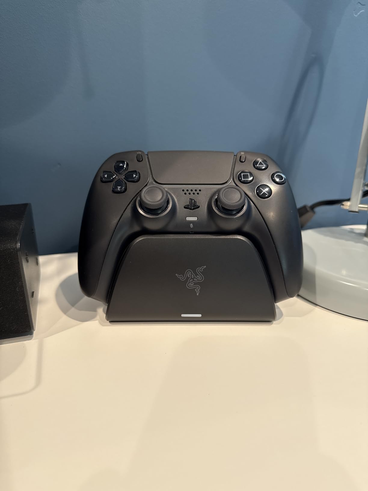 Razer Quick Charging Stand for PlayStation 5: Quick Charge - Curved Cradle Design - Matches PS5 DualSense Wireless Controller - One-Handed Navigation - USB Powered - White (Controller Sold Separately) customer photo 1